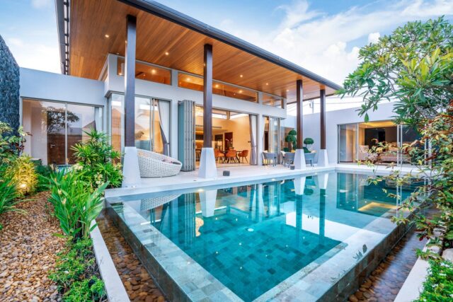 home or house building Exterior and interior design showing tropical pool villa with green garden